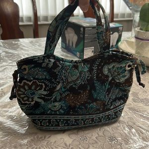Vera Bradley, mixes of teals and blues with brown’s and white.